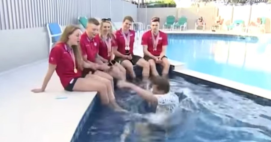 News Reporter Hilariously Falls In The Pool During Interview