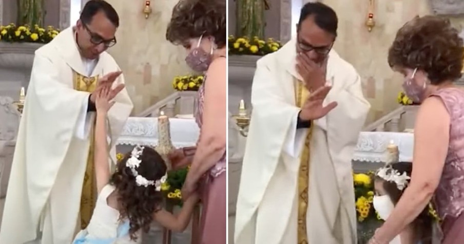 Hilariously Confused Little Girl Decides To High-Five Priest When She Sees His Hand Raised