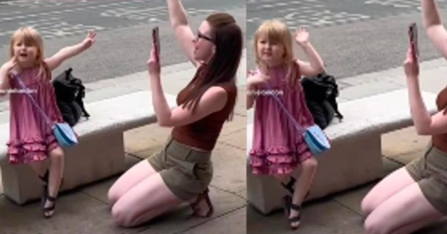 Mother Gets on Knees to Sing a Worship Song in Middle of the Street & Her Sweet Child Joins in