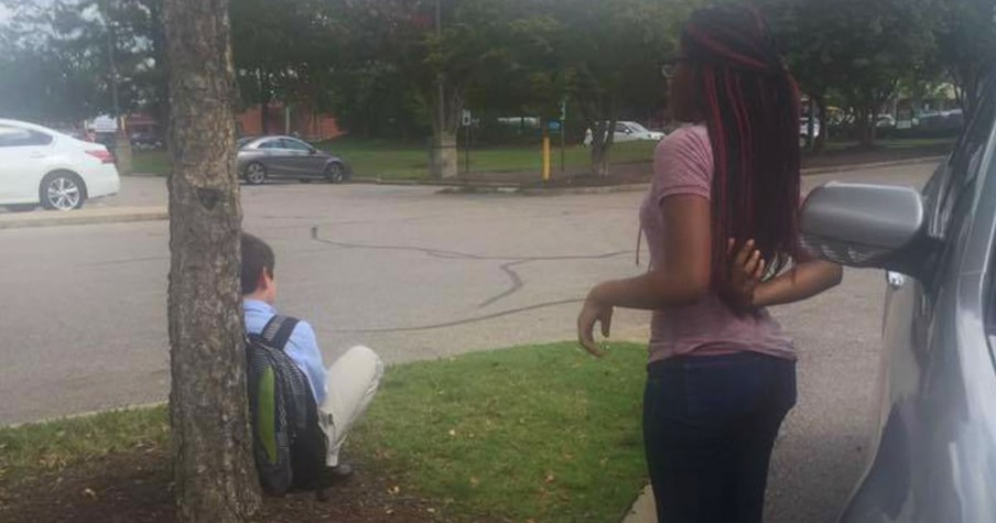 14-Year-Old Girl Steps In When She Spots A Stranded Boy Sitting Alone In A Parking Lot