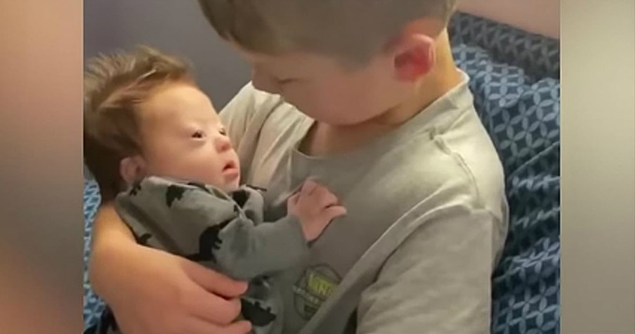 Little Boy Singing To Baby Brother With Down Syndrome Has Hearts Bursting All Over