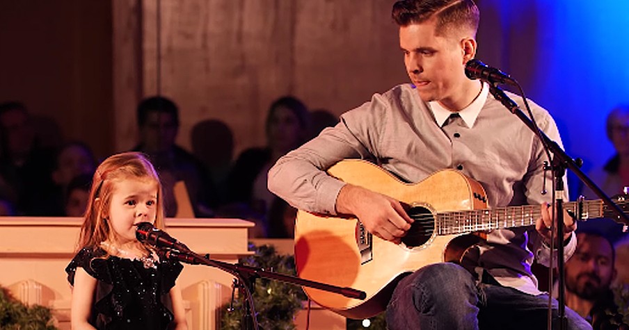 Sweet Girl Sings 'O Holy Night' With Her Daddy