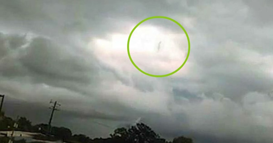 Woman's Footage From Storm Reveals Mysterious Figure Walking In The Clouds