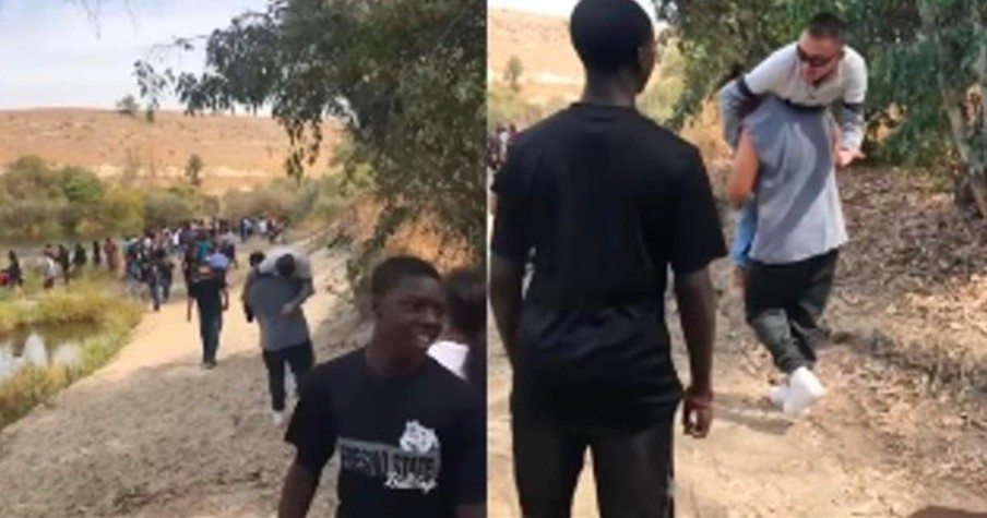 Incredible Moment Students Carry Teacher When The Man's Wheelchair Won't Roll Through Sand