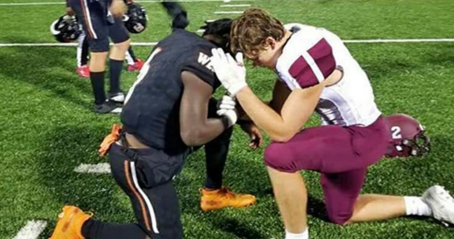 Texas High School Football Player Praying on Field with Opponent Is Beautiful Picture of Unity in Christ