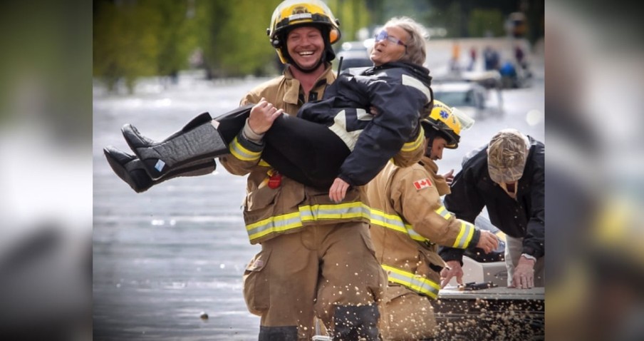 Elderly Lady Cracks Firefighter Up In The Midst Of Her Rescue