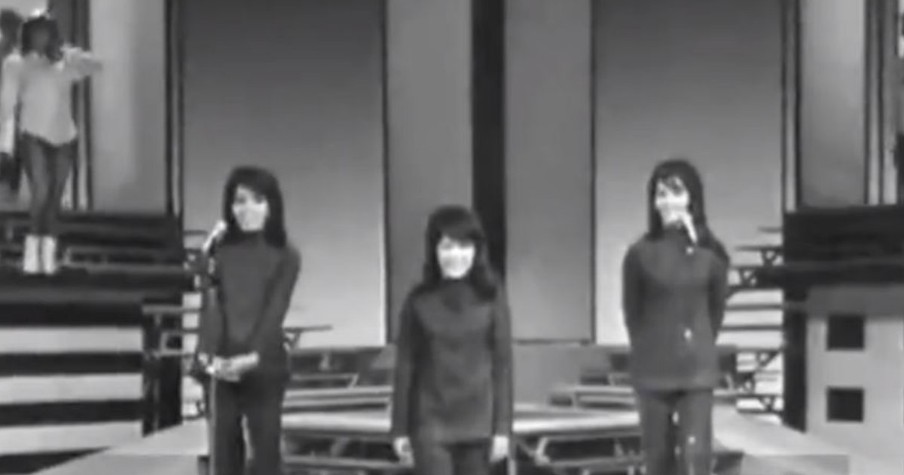 Singing Group Performs Classic Hit In The 1960's