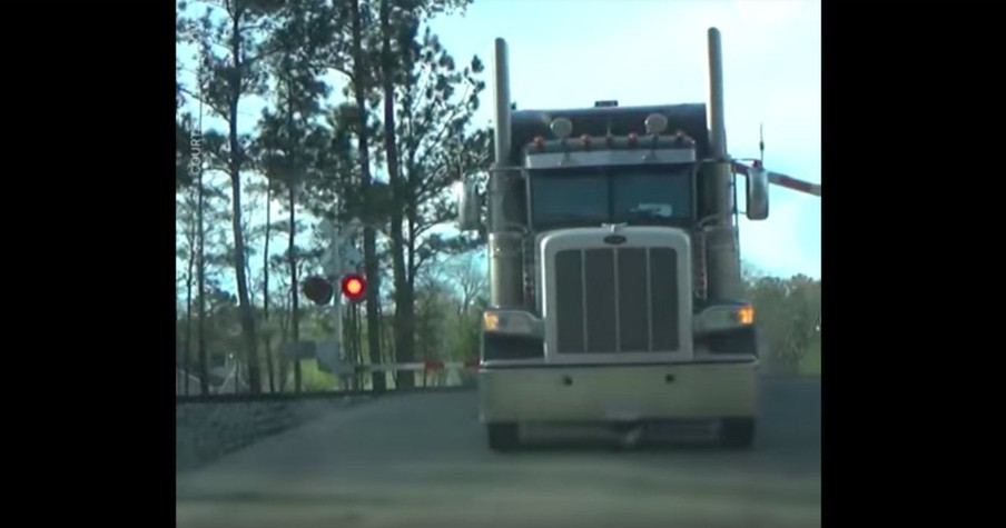 A Truck Driver Quickly Escaped His Truck Just In Time Before A Train Ran Into It