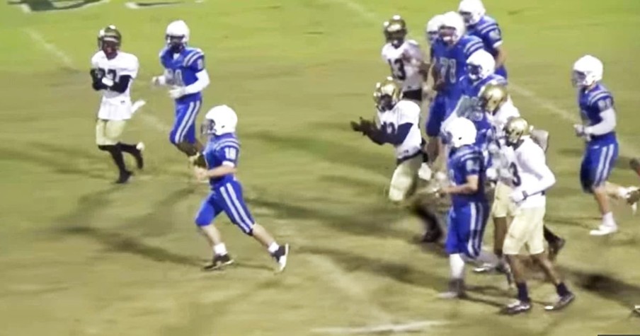 Rival Teams Come Together For The Touchdown Of The Year