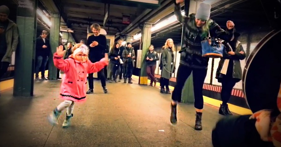 Little Girl Dancing in NYC While Waiting for the Subway