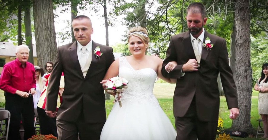 Bride's Dad And Step Dad Walk Her Down The Aisle At Her Wedding