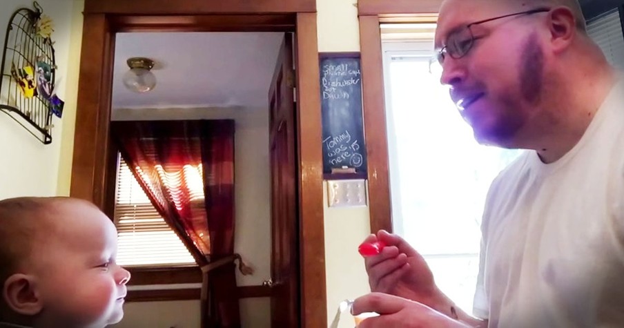 Dad Sings Parody Of Lionel Richie's 'Hello' While Feeding His Bab