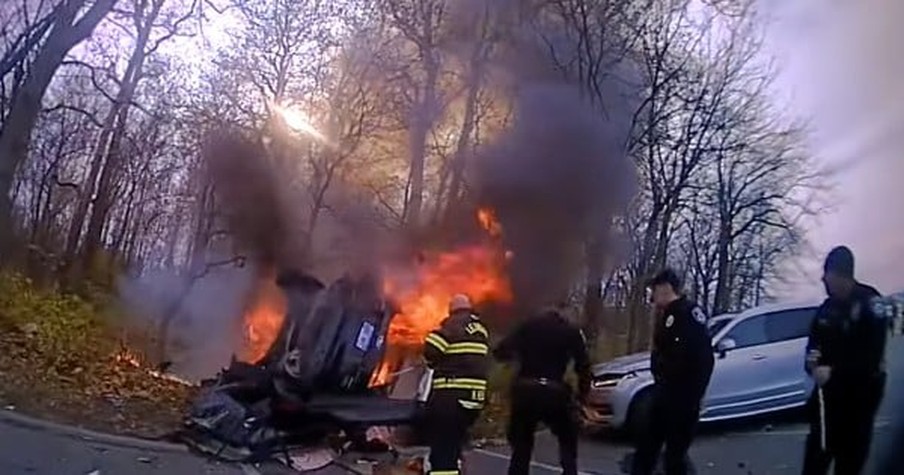 Police Work Fast To Rescue Woman From A Burning Car And Cameras Caught It All