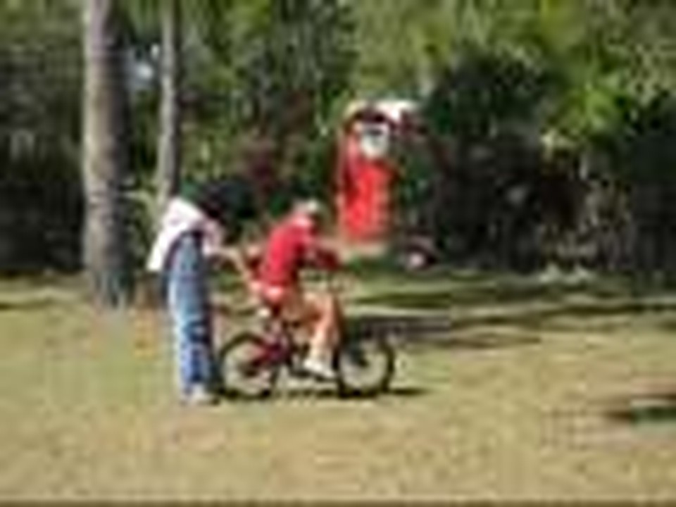 Kaitlyn learns to ride her bike!