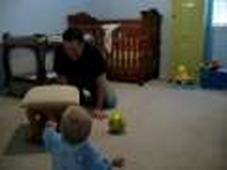 Baby giggling with Daddy and the Dog