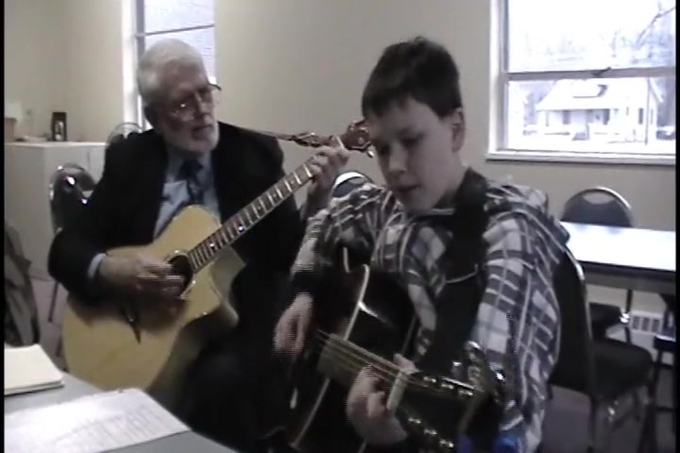Alex sings Three Wooden Crosses