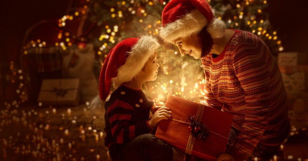mother and son looking in magic present at christmas, best parts of christmas not presents