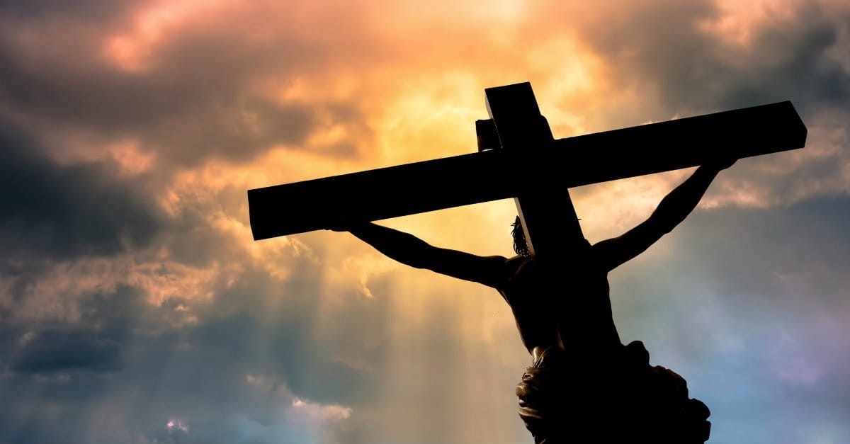 silhouette of Jesus on the cross