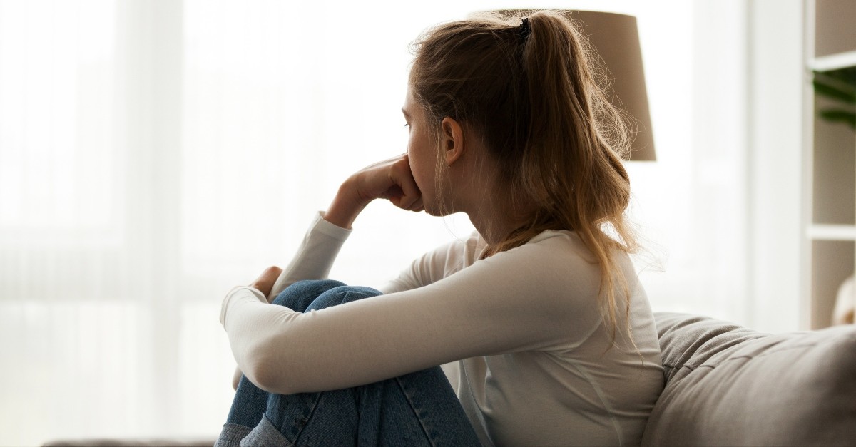 Woman looking out the window; is discontent a sign of covetousness?