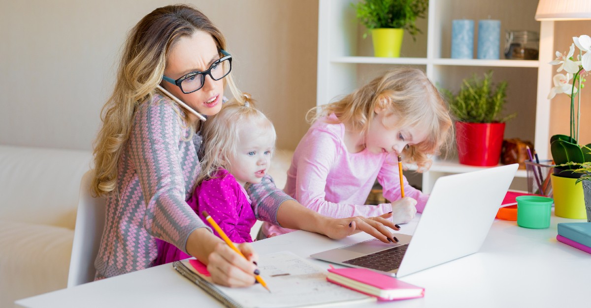 Stressed out, busy mom with two little kids