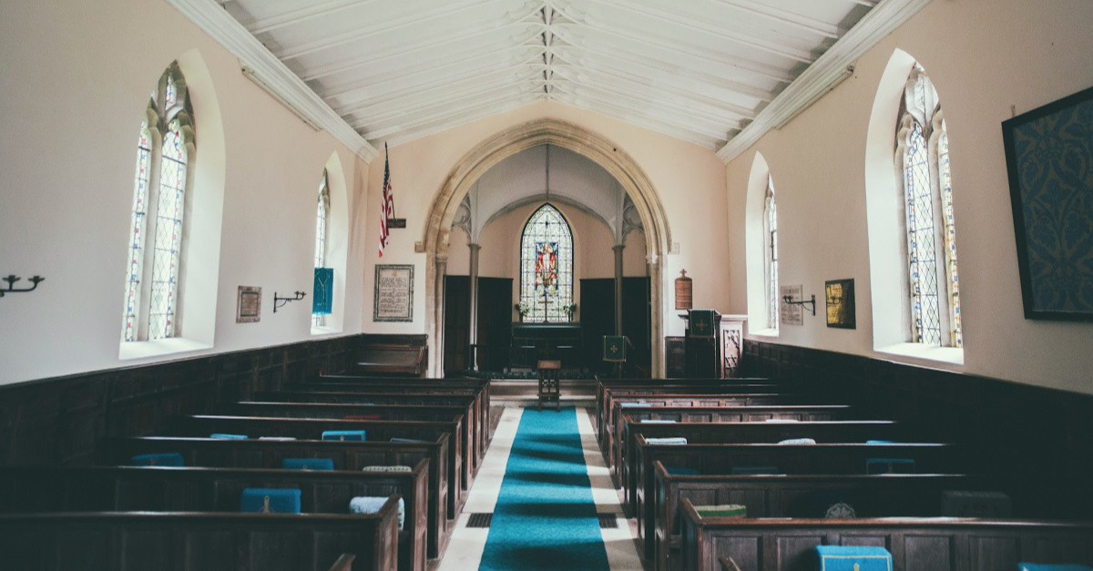An empty church, church suspends in-person services after families contract COVID-19