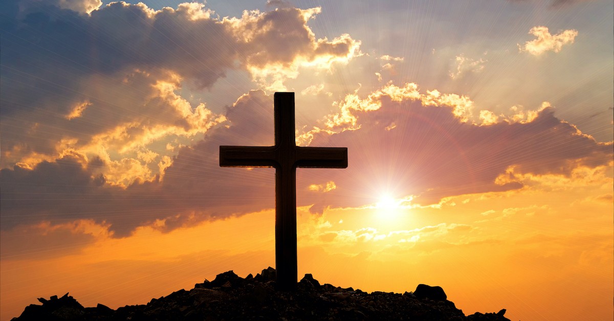 silhouette of cross against sunset background, resurrection day