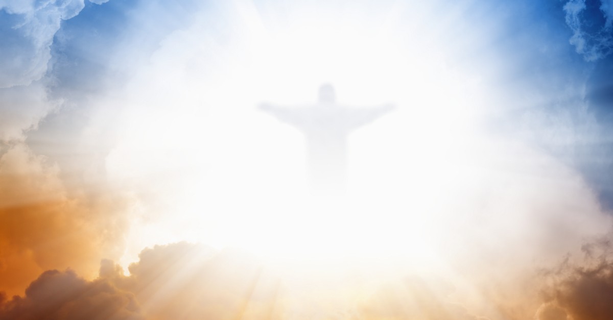 image of Jesus Christ bursting through blue and orange sky Son of God, hebrew words in the bible