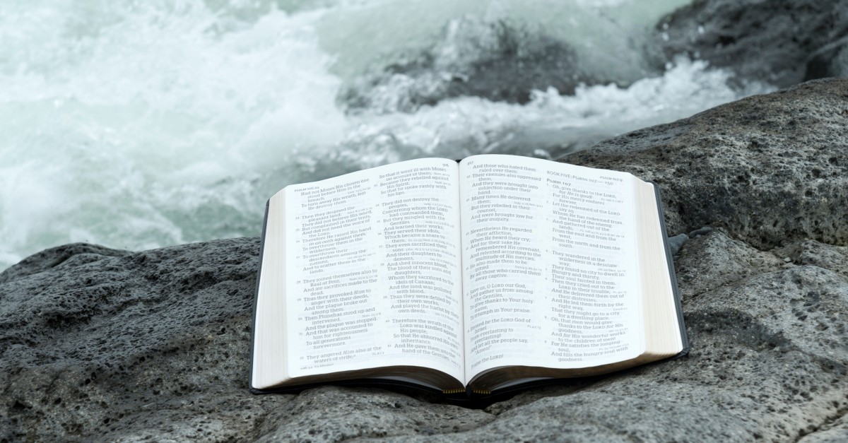 bible open on rock at sea to book of psalms for comfort; what does the Spirit do for you?