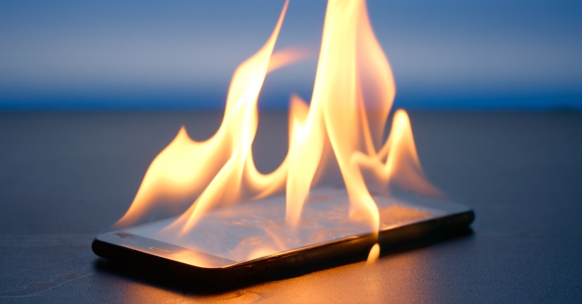 cell phone on fire satan social media