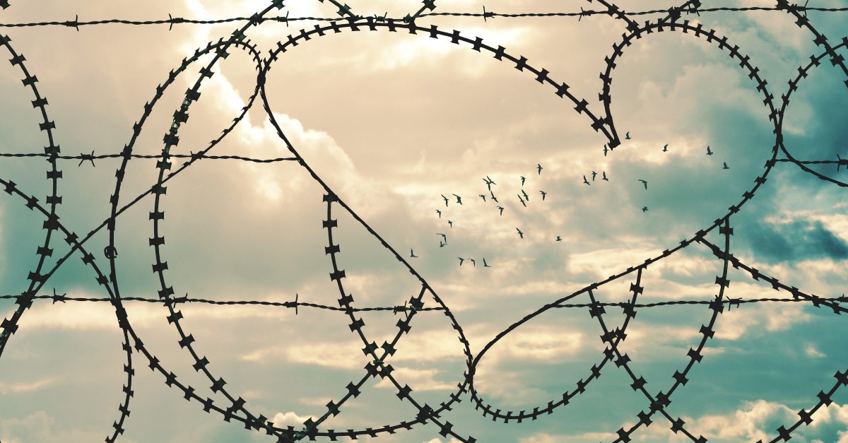 barbed wire in heart shape to signify breaking free of sin