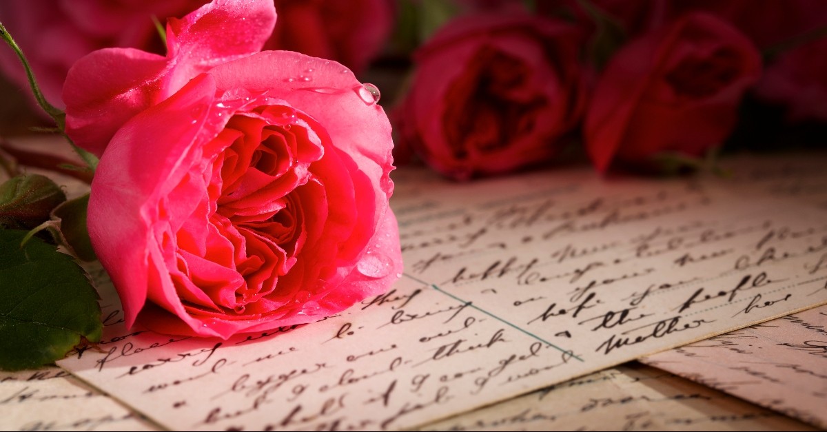 Letter with roses to illustrate love letter for husband