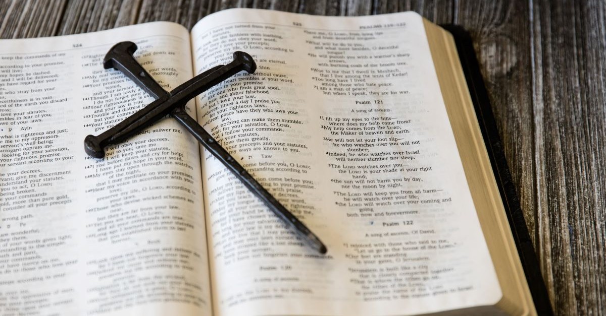 open bible psalms nails cross crucifixion prophecy