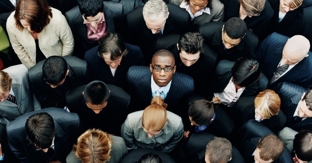 going against the crowd different unique choices looking up businessman