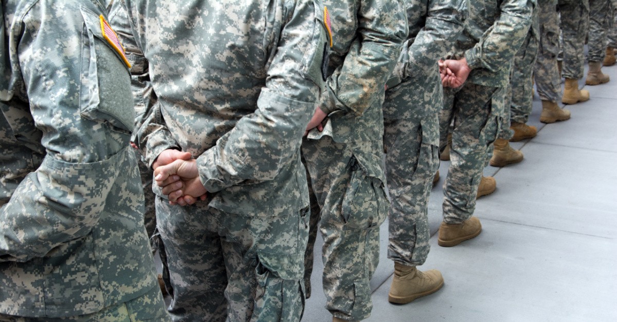 Army members, 7 soldiers are baptized in makeshift baptismal tub