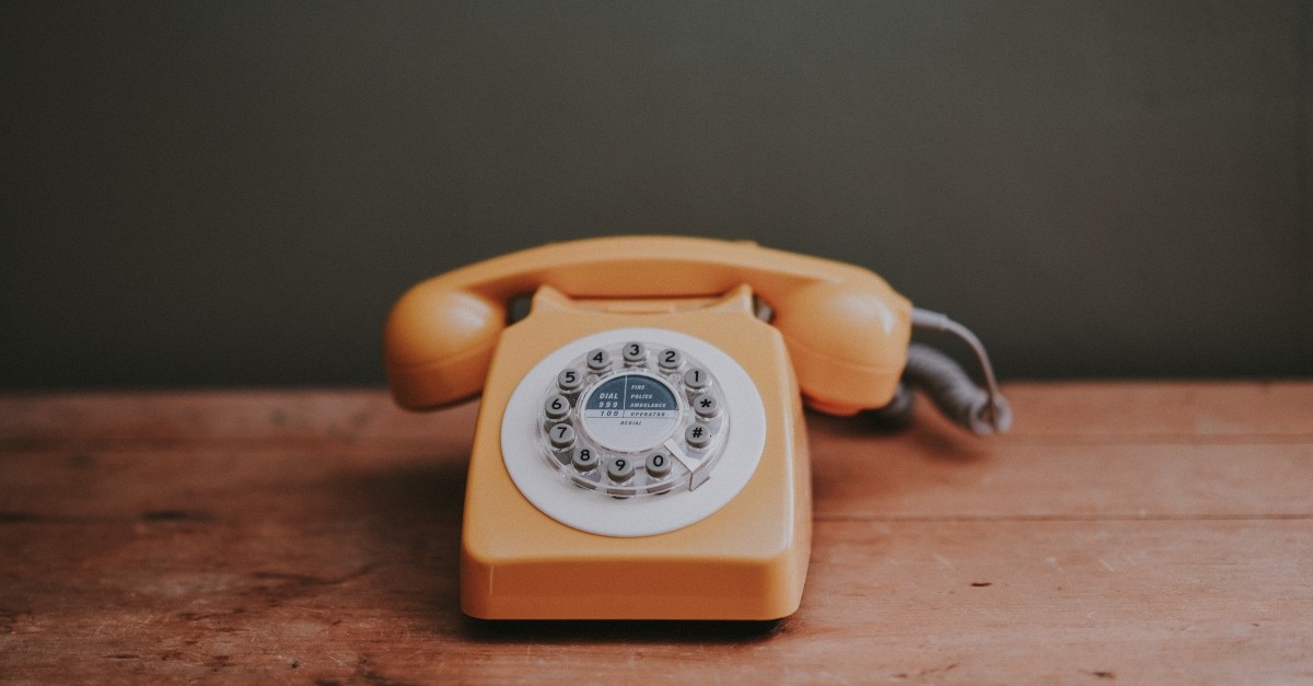 Old fashioned orange telephone