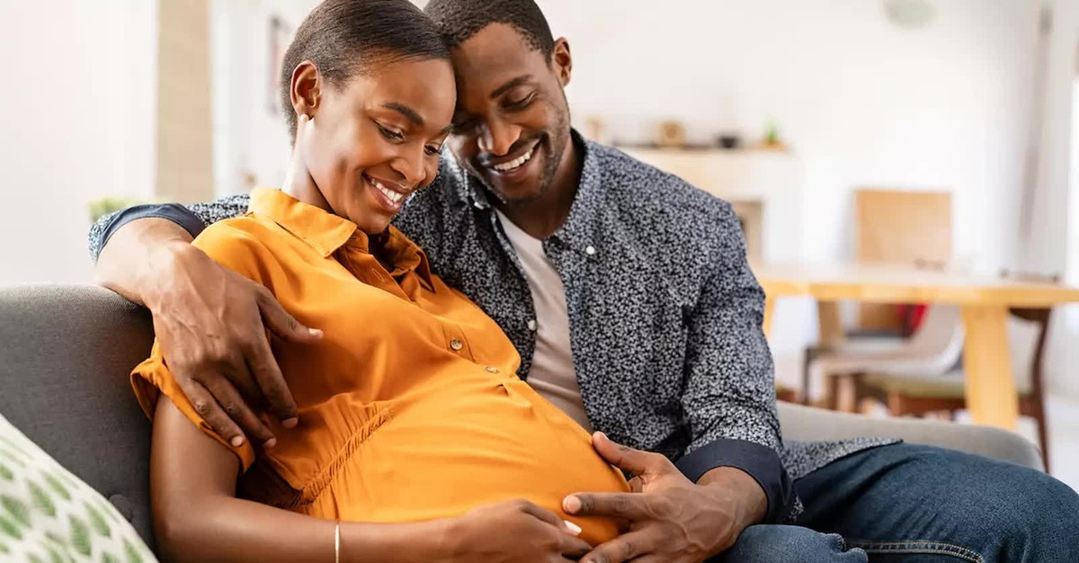 Happy pregnant couple expecting baby
