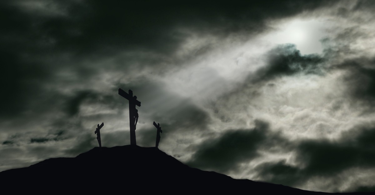 cloudy grey image of calvary with jesus on the cross, carry the hope of suffering