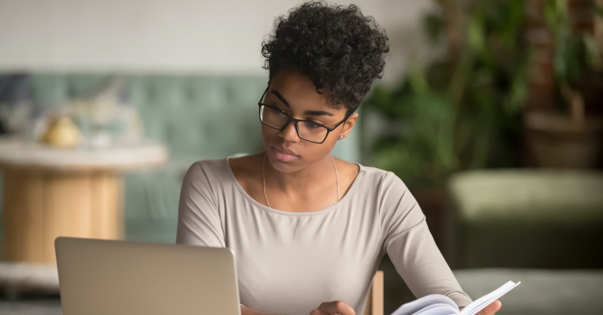 A woman on a computer, Online church attendance went up four fold this weekend