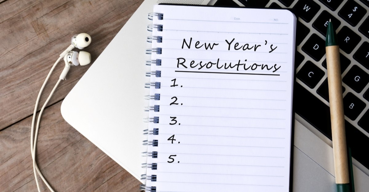 new years resolution notebook on laptop