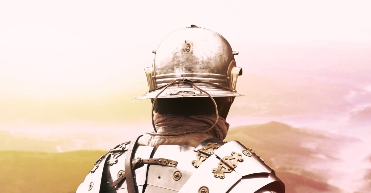 Roman soldier looking away from camera emphasis on helmet, helmet of salvation armor of god