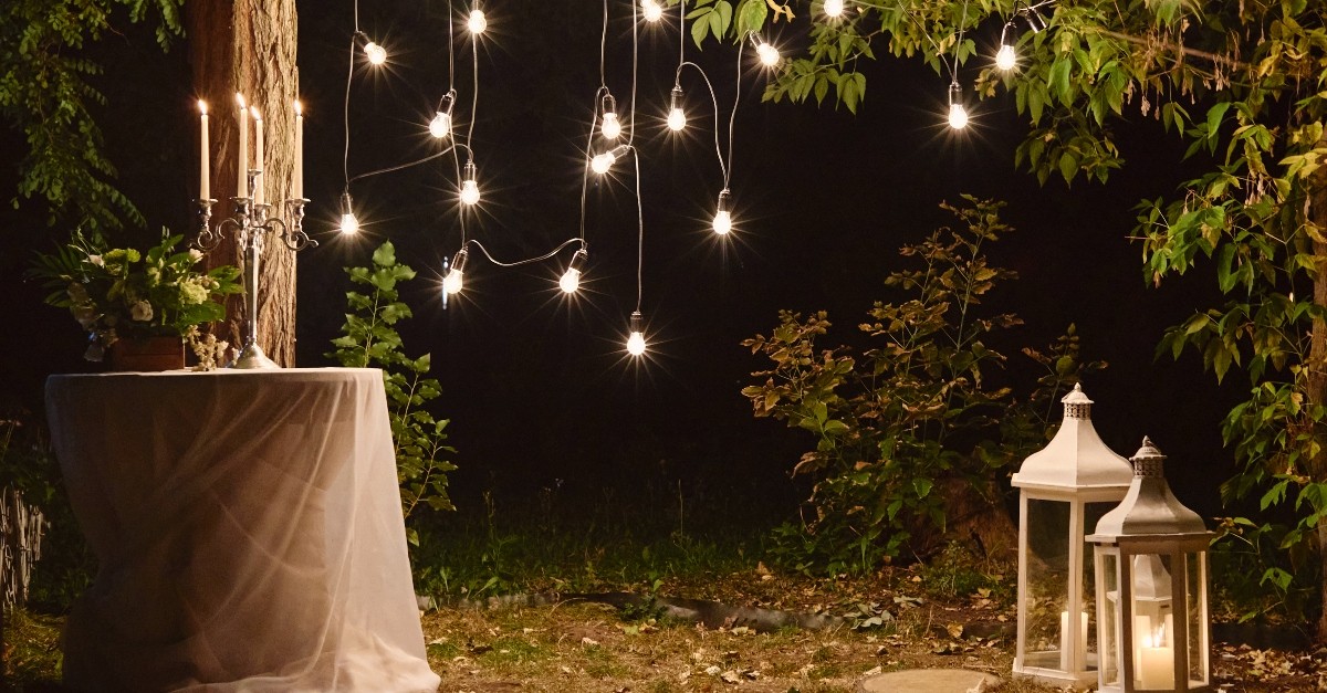 Wedding venue with string lights and candles