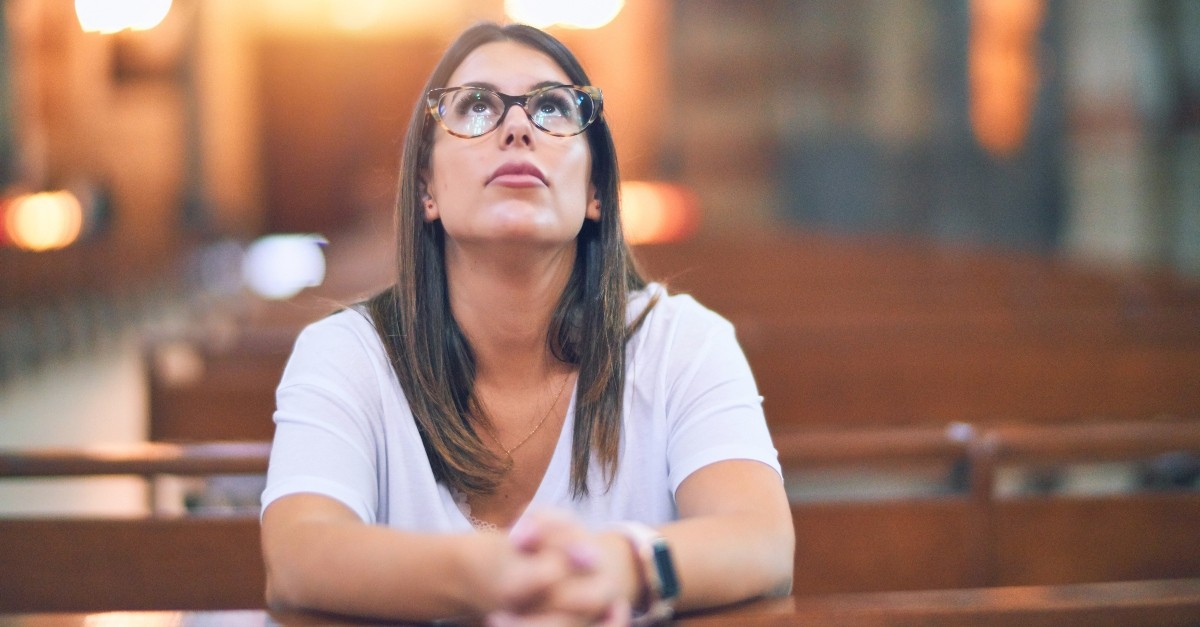 Woman in church praying