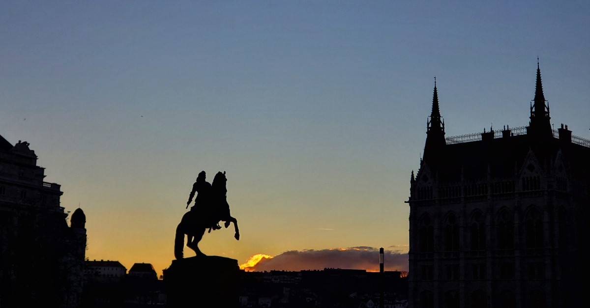 Silhouette of a statue of a knight on horseback
