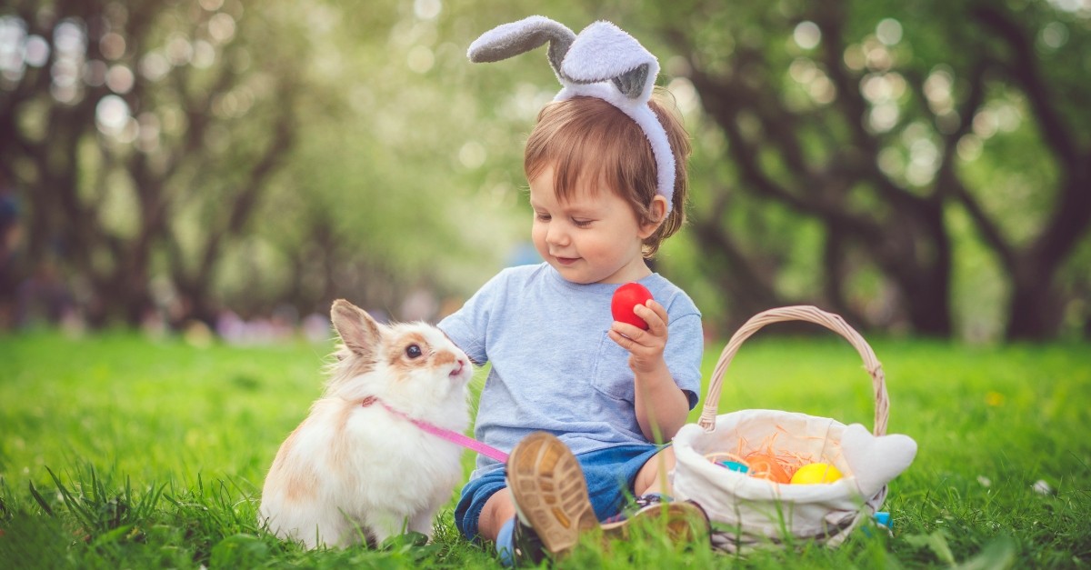 Child with a bunny and eggs