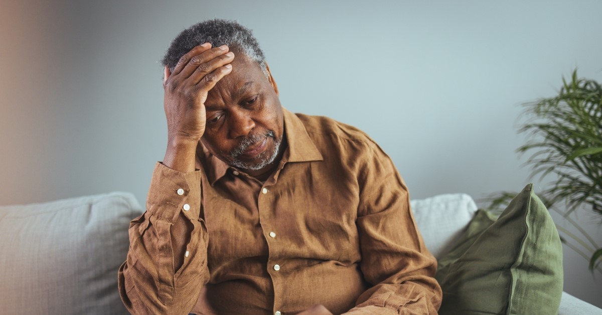 mature african-american man looking stress, is there a way to be happy even in sadness