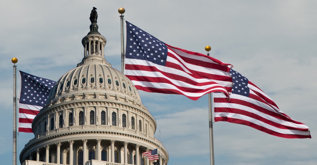 US Capitol and American flag, we need to avoid a rematch of 2020