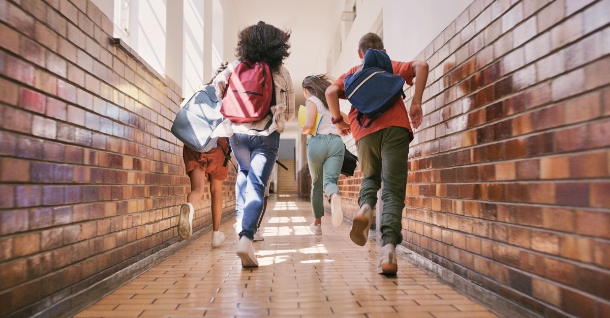 Kids running down the hallway at school