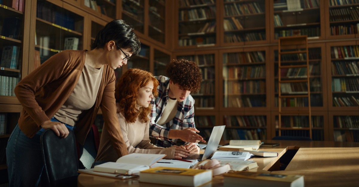 students in a library, colleges are changing and you will have to too