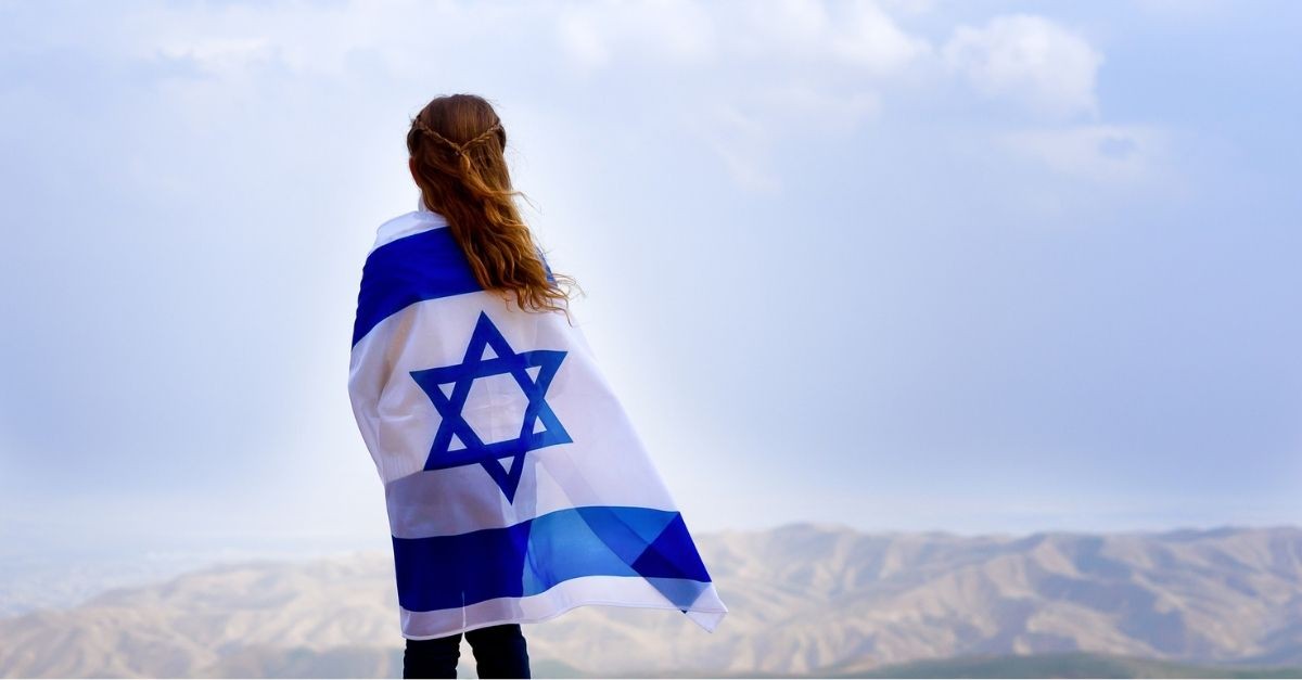 Little girl with Israeli flag; a day in a war like no other.