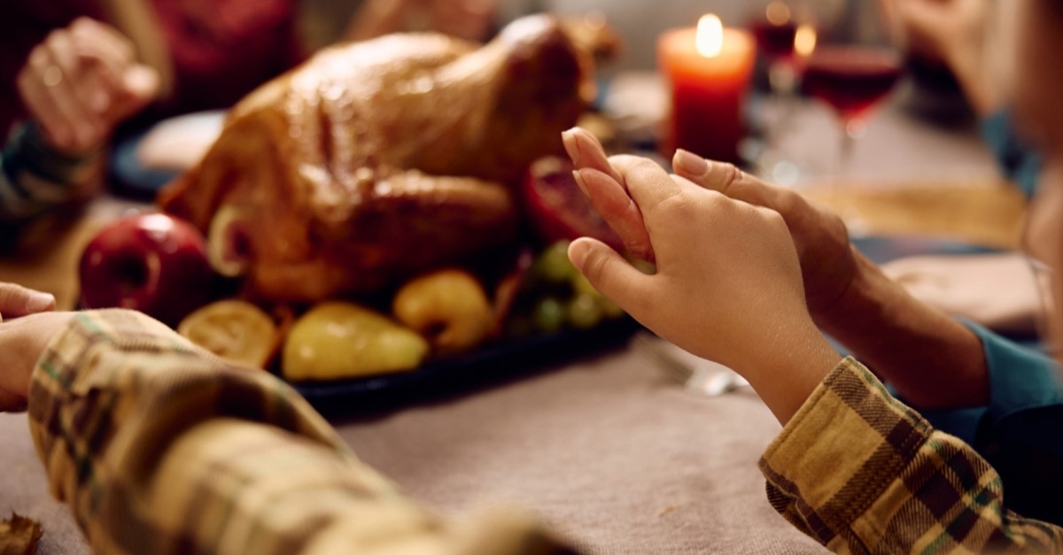 family holding hands thanksgiving